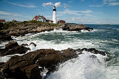 Rough Surf at High Tide by Portland Head Light in Maine